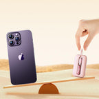 Joyroom mini išorinė baterija 10000mAh Colorful Series 22.5W su 2 integruotais USB-C ir Lightning laidais - rožinė (JR-L012)