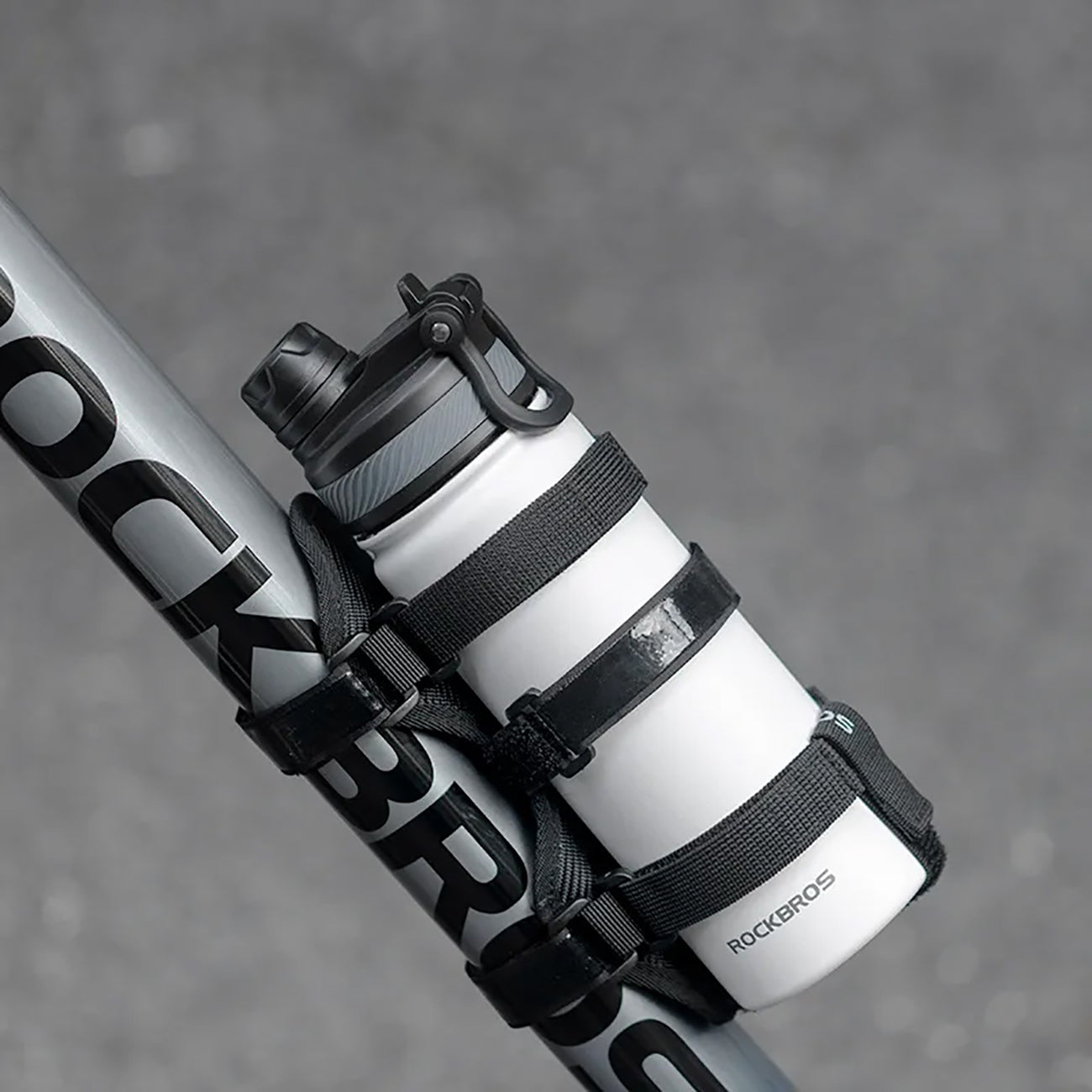 Rockbros 50210064001 lipūs dviračio dirželis Bluetooth garsiakalbiam ar vandens buteliui - juodas -- Sports Water Bottles