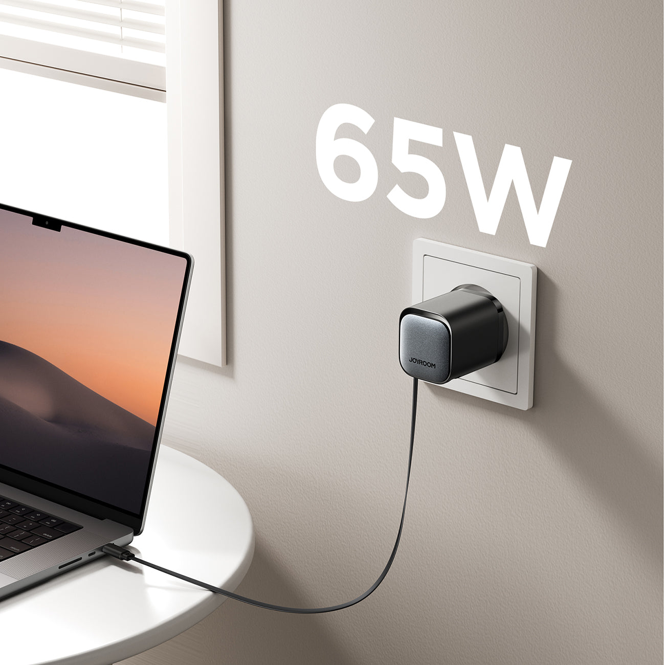 Joyroom JR-TCL02 65W USB-A USB-C GaN įkroviklis su integruotu USB-C laidu - juodas
