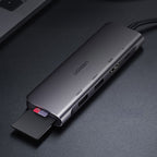 Ugreen CM195 6in1 adapteris USB-C - HDMI / 2x USB-A 3.0 / USB-C PD / SD / TF skaitytuvas - pilkas -- USB Hubs