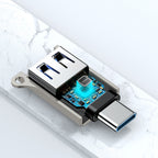 Joyroom S-H151 USB-C (vyriškas) / USB-A (moteriškas) adapteris su diržo kilpa – sidabrinis