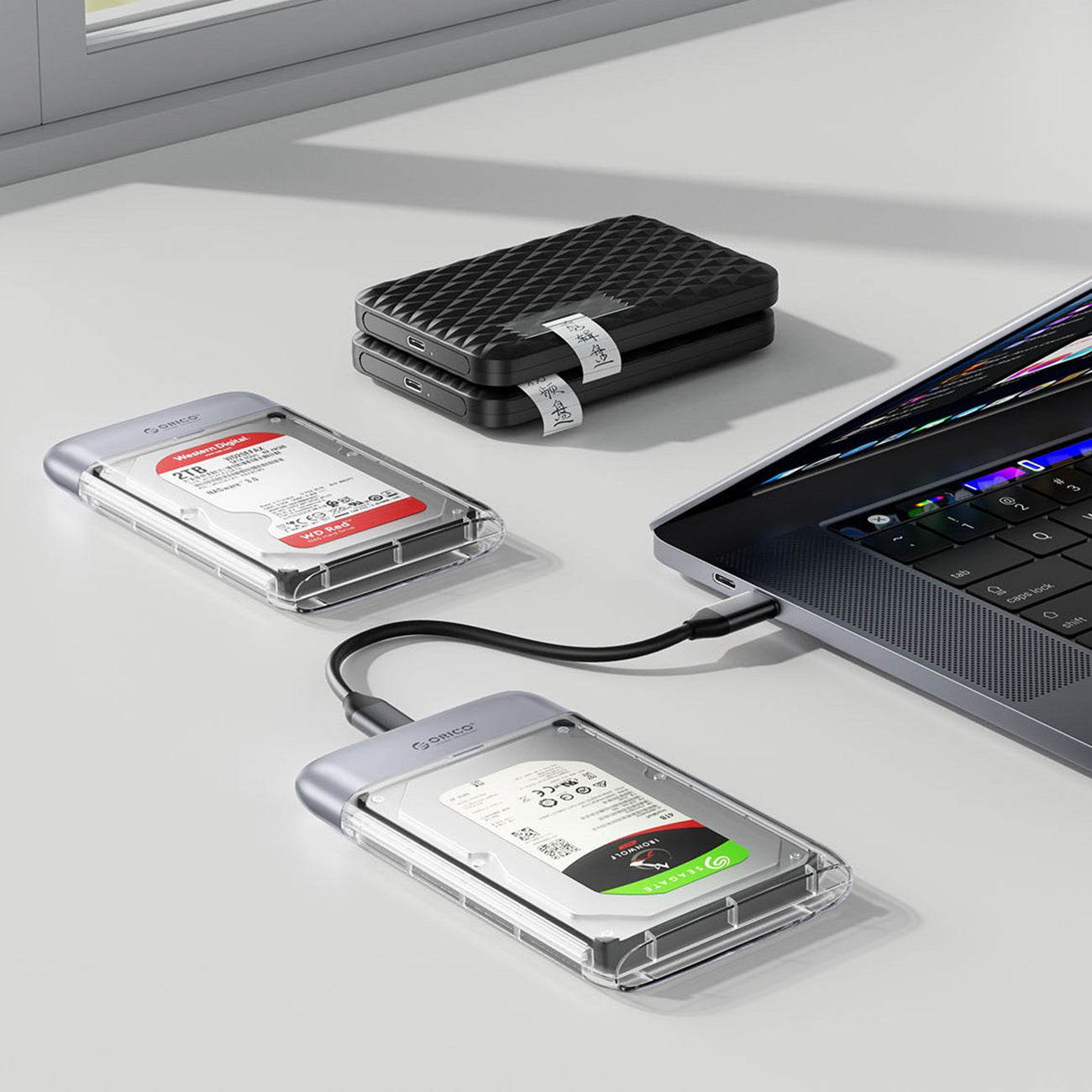 Orico TX25C3 2.5" HDD/SSD USB-C 5Gb/s diskų šachtis - Skaidra -- Hard Drive Adapters