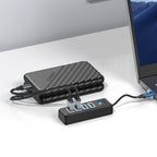 Orico PW4U-C3 USB-C / 4x USB-A 3.0 Hub - Juodas -- USB Hubs