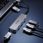 Orico YSB4-U2 USB-C Hub Doko Stotele 2x USB-A 2.0 + 1x USB-A 3.0 + 1x USB-C 2.0 + 1x USB-C - Pilka -- USB Hubs
