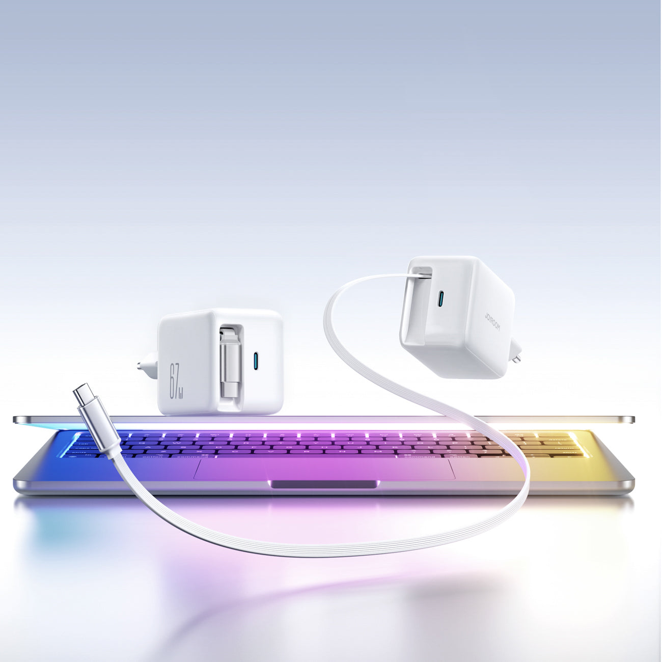 Joyroom JR-TCL06 67W GaN sieninis įkroviklis su integruotu įtraukiamu USB-C laidu - baltas