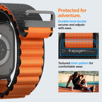 Spigen WBF1 dirželis, skirtas Apple Watch 44/45/46/49 mm – juodas ir oranžinis