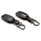 Spigen TK100 automobilių raktų dėklas - juoda -- Cell phone cases and covers