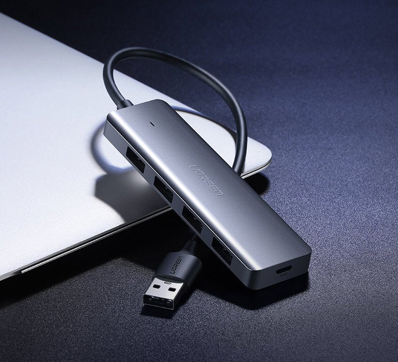 Ugreen USB HUB - 4x USB 3.2 Gen 1 su micro USB maitinimo prievadu pilkas (CM219 50985) -- USB Hubs