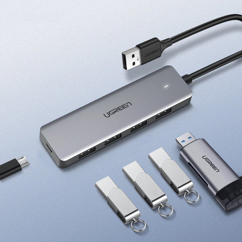 Ugreen USB HUB - 4x USB 3.2 Gen 1 su micro USB maitinimo prievadu pilkas (CM219 50985) -- USB Hubs