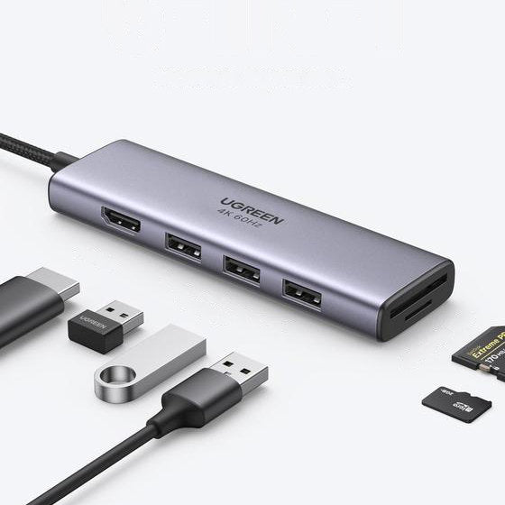 Ugreen daugiafunkcis HUB USB Type C - 3x USB 3.2 Gen 1 / HDMI 4K 60Hz / SD ir TF kortelių skaitytuvas pilkas (60383...