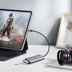 Ugreen daugiafunkcis HUB USB Type C - 3x USB 3.2 Gen 1 / HDMI 4K 60Hz / SD ir TF kortelių skaitytuvas pilkas (60383...