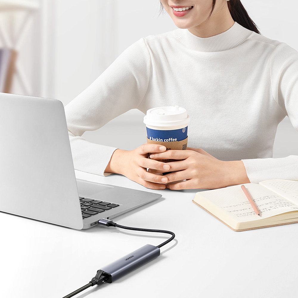 Ugreen daugiafunkcis adapteris HUB USB 3.0 - 3 x USB / Ethernet RJ-45 / USB Type C PD pilkas (CM475) -- USB Hubs