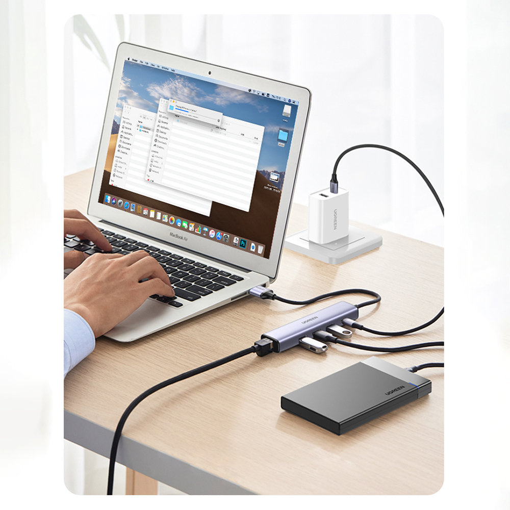 Ugreen daugiafunkcis adapteris HUB USB 3.0 - 3 x USB / Ethernet RJ-45 / USB Type C PD pilkas (CM475) -- USB Hubs