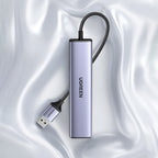 Ugreen daugiafunkcis adapteris HUB USB 3.0 - 3 x USB / Ethernet RJ-45 / USB Type C PD pilkas (CM475) -- USB Hubs