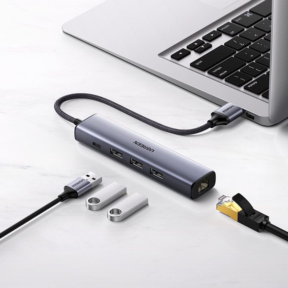 Ugreen daugiafunkcis adapteris HUB USB 3.0 - 3 x USB / Ethernet RJ-45 / USB Type C PD pilkas (CM475) -- USB Hubs