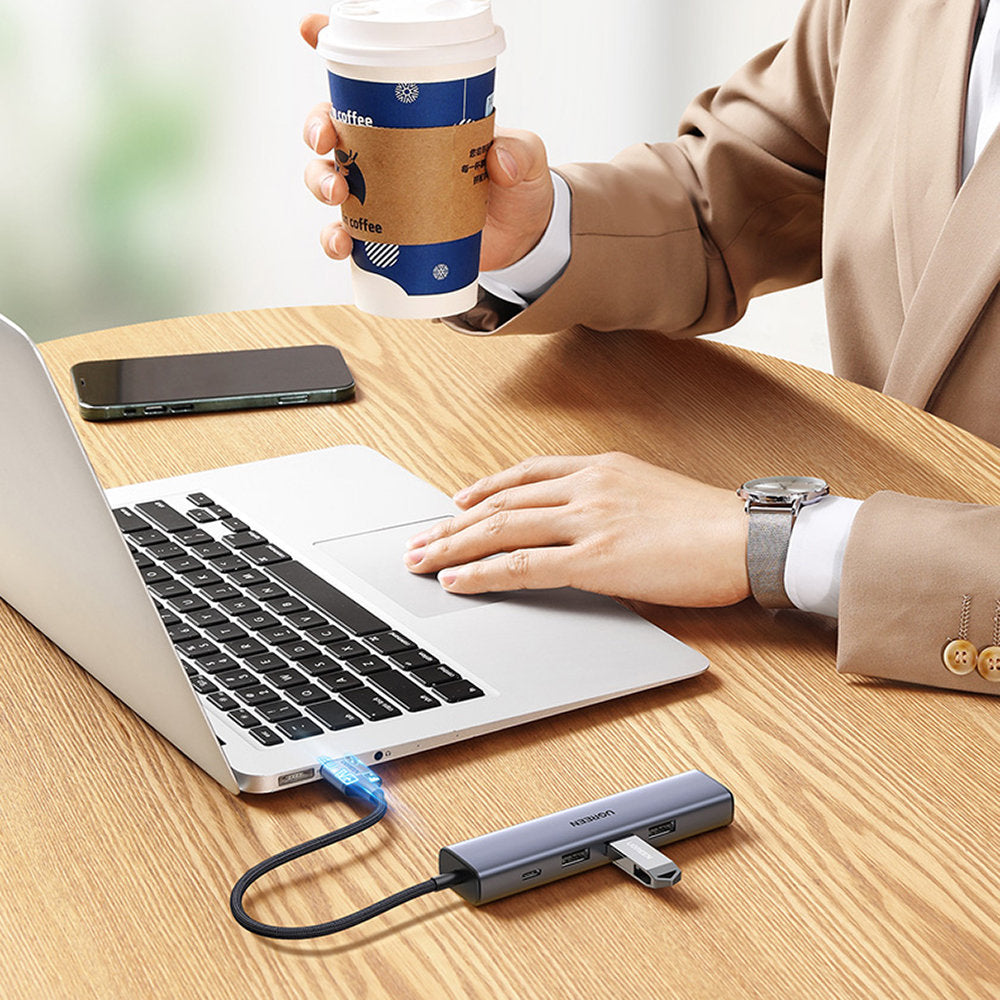 Ugreen daugiafunkcis adapteris HUB USB 3.0 - 3 x USB / Ethernet RJ-45 / USB Type C PD pilkas (CM475) -- USB Hubs